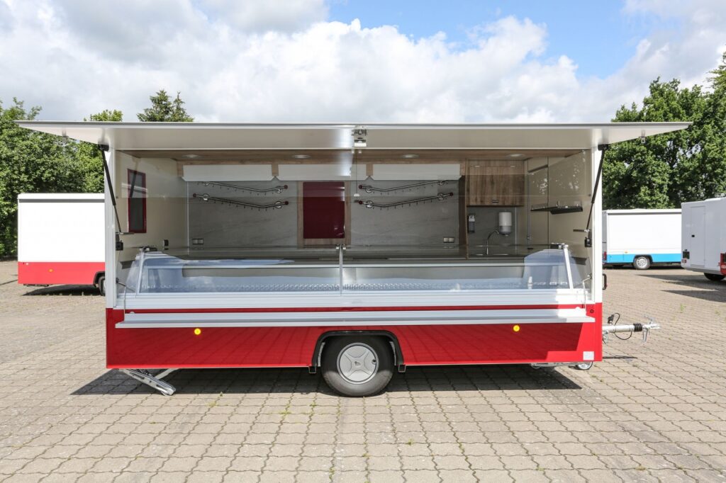 BÄRO-LED-Strahler, Panorama Thekenverglasung, diverses Thekenzubehör, Wurstgehänge, Werbetafel mit Glasschriftfeld uvm.