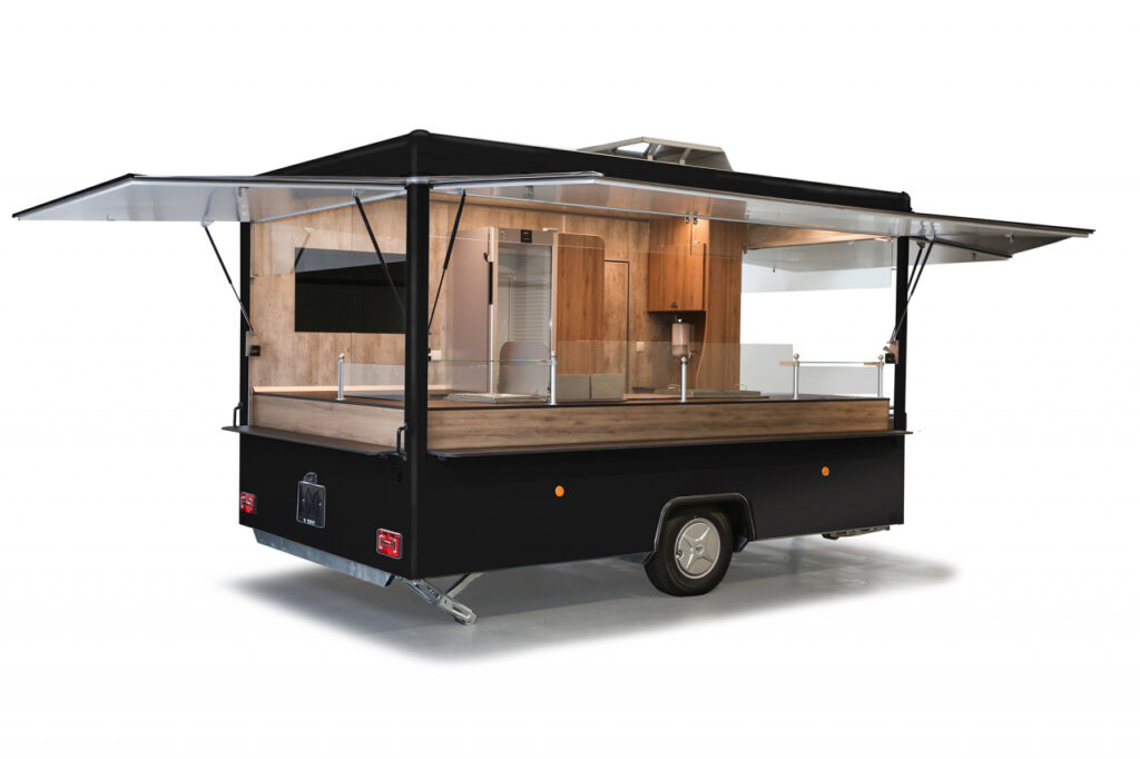 Imbissanhänger ab sofort verfügbar!-Dekore abweichend, Lackierung in RAL 9005 tiefschwarz-Doppelfritteuse, Bainmarie mit 3 GN-Behältern, Rostgrill und Griddlepfanne