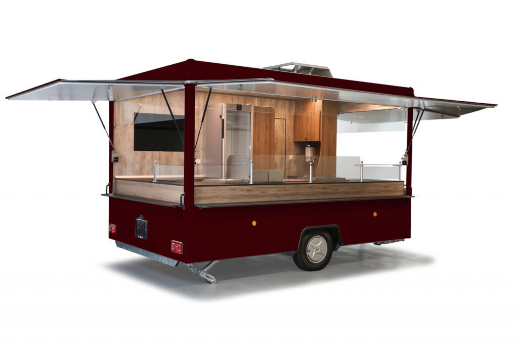 Imbissanhänger ab sofort verfügbar!-Dekore abweichend, Lackierung in RAL 3007 schwarzrot-Doppelfritteuse, Bainmarie mit 3 GN-Behältern, Rostgrill und Griddlepfanne