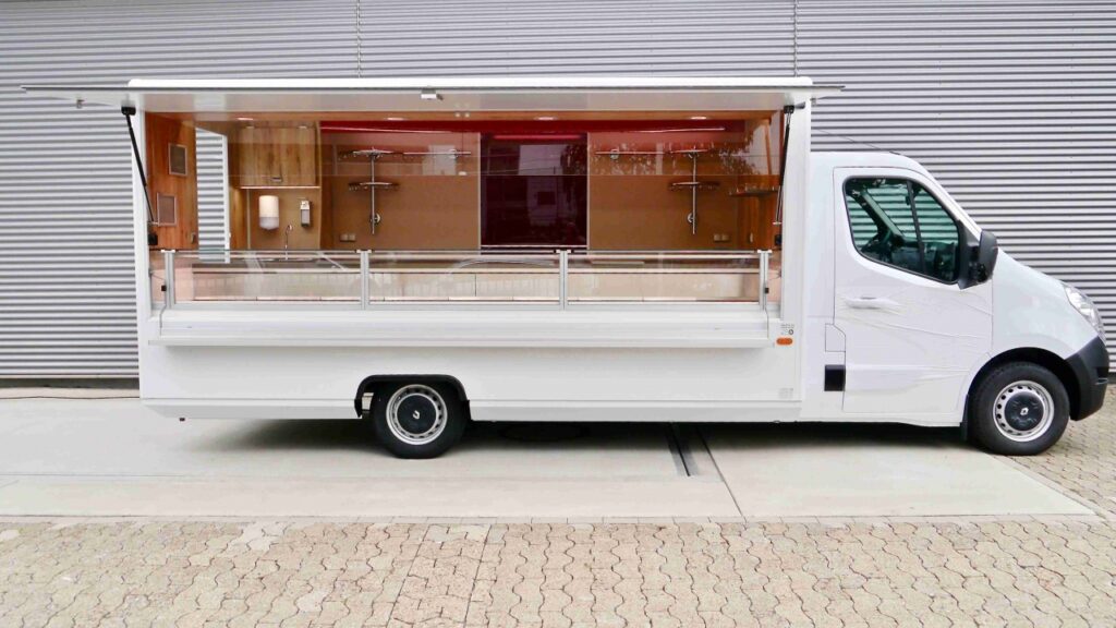 Arbeitsfläche,Verkaufskühltheke OPTIMA,Unterschrank, Kühlfach unter Kühltheke,Edelstahl Systemträger,BÄRO-LED Einbauleuchten,Hygienepaket nach DIN 10500,Werbetafel mit Glasschriftfeld,Plakatrahmen.- -Achtung: Fahrzeug steht in Rohrbach, Schweiz!