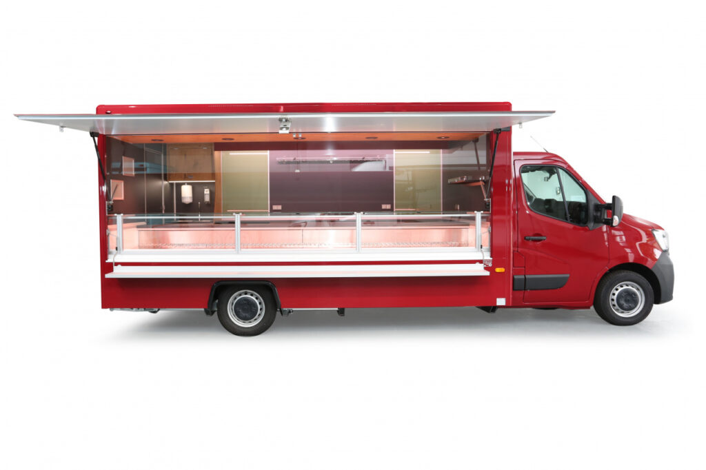 Fleischverkaufsmobil mit 4,50m Kühltheke mit 2 Kühlschubladen.-Ausstattungsdetails: 0,80m Wandregal, Hakenschiene-Basisfahrzeug Renault Master, 145 PS mit Allwetterbereifung und Klang & Klima-Paket