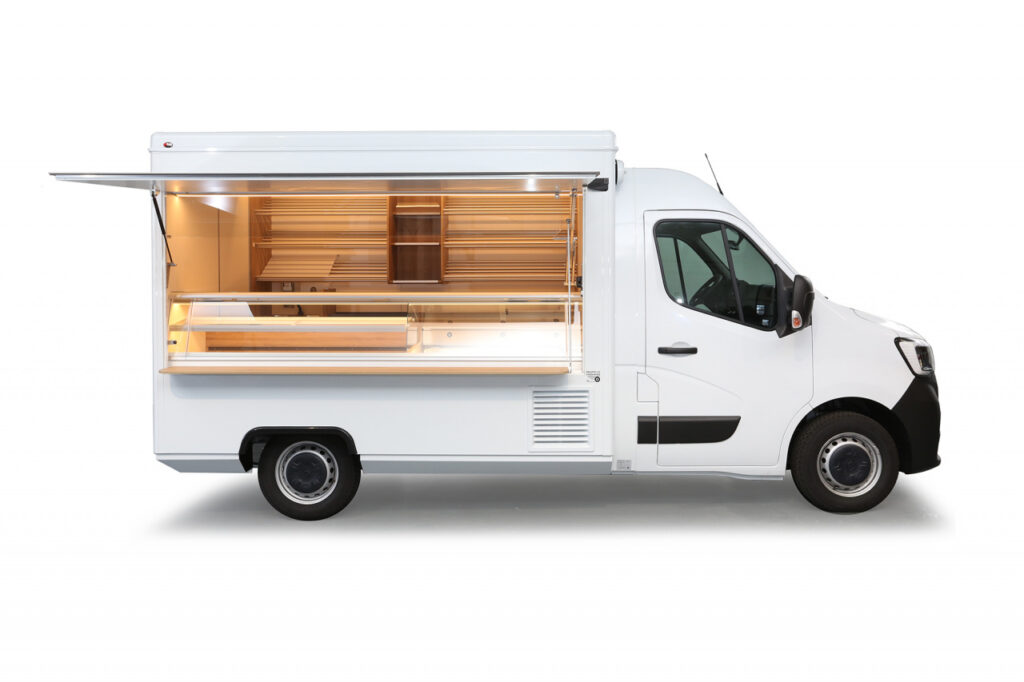 Backwarenverkaufsmobil mit 1,30m Kühltheke-Ausstattungsdetails: Präsentationsregal, Papierrollenhalter, Kuchenblechnachschubregal, Krümelplatte uvm.-Renault Master mit Klang & Klima Paket und Allwetterbereifung