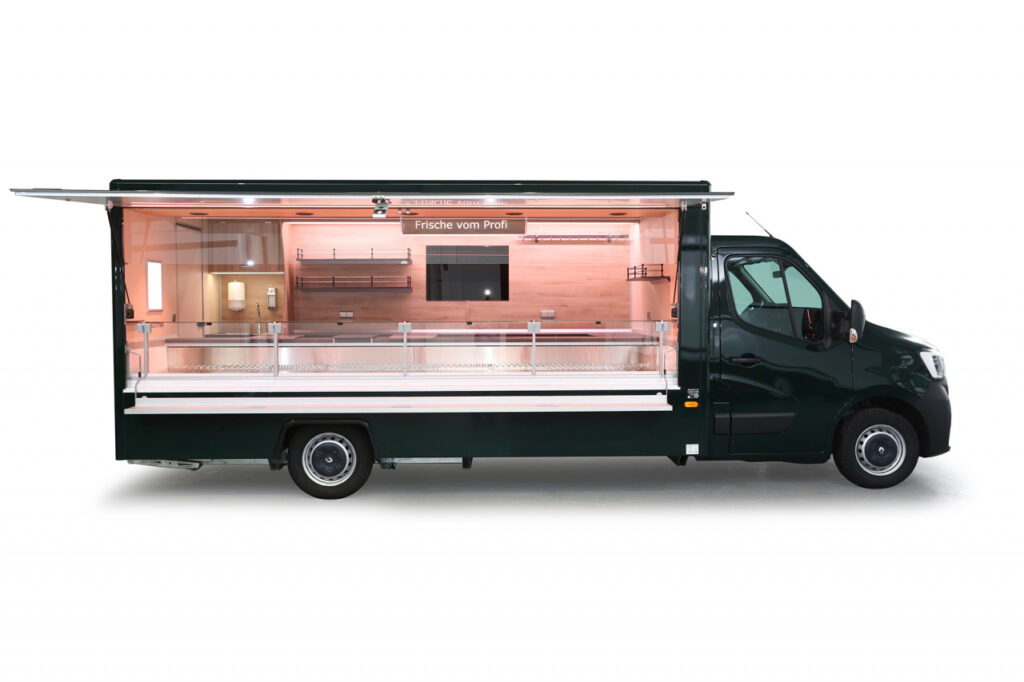 edles Verkaufsmobil mit gehobener Ausstattung-Kühltheke mit 740 mm Auslage, unterhalb drrei Kühlfächer für insgesamt 6 E-Kisten-Regale, Werbetafel, Hakenschiene und Notbeleuchtung
