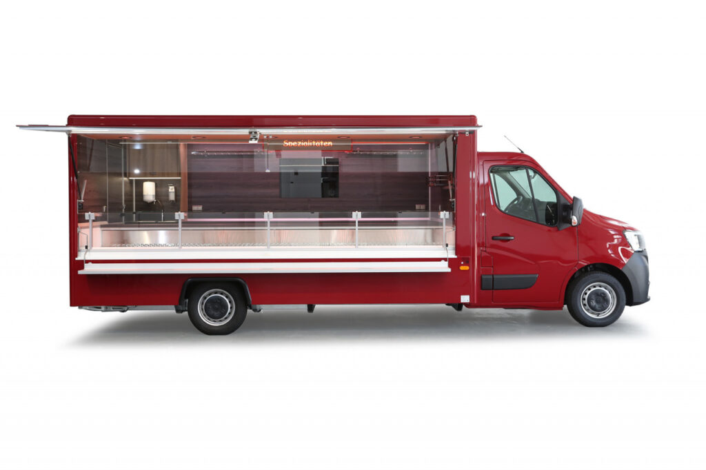 Wochenmarktmobil in moderner Ausstattung-Kühltheke mit stiller Kühlung, unterhalb 2 Kühlauszüge für 4 E-Kisten-400 Volt Stromanschluss-Renault Master mit Allwetterbereifung und Radio